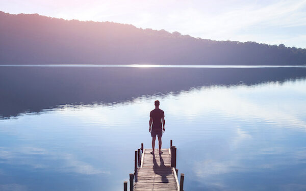 human strength or psychology concept, man standing on pier